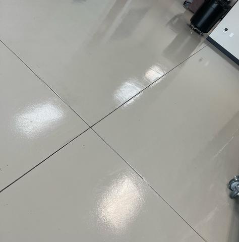 An office floor polished to a clean, streak-free shine.