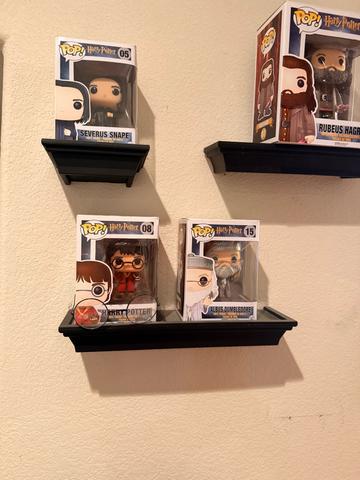 Display shelves dusted, with the items neatly arranged.