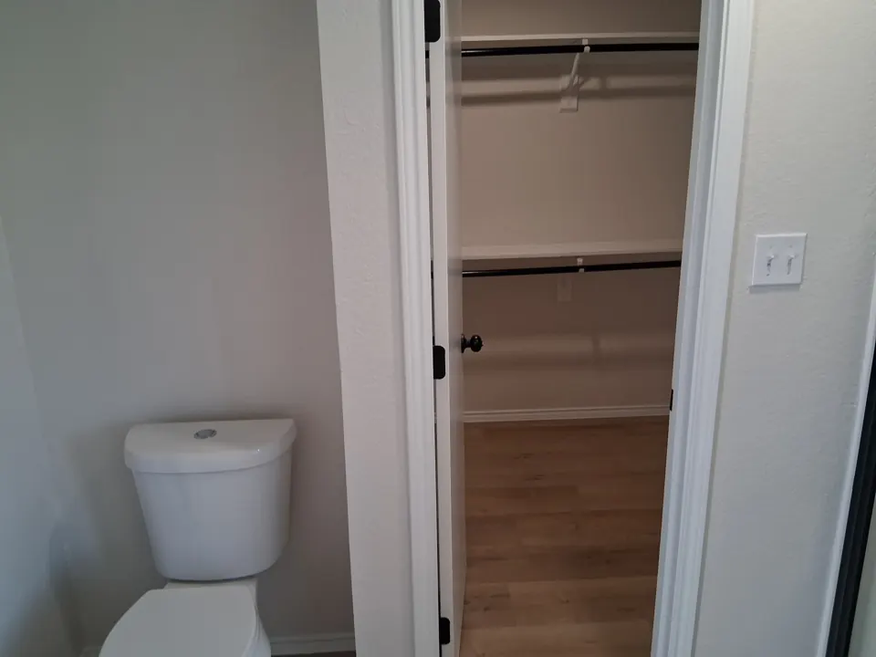 Clean closet doorway and bathroom after a move-out cleaning
